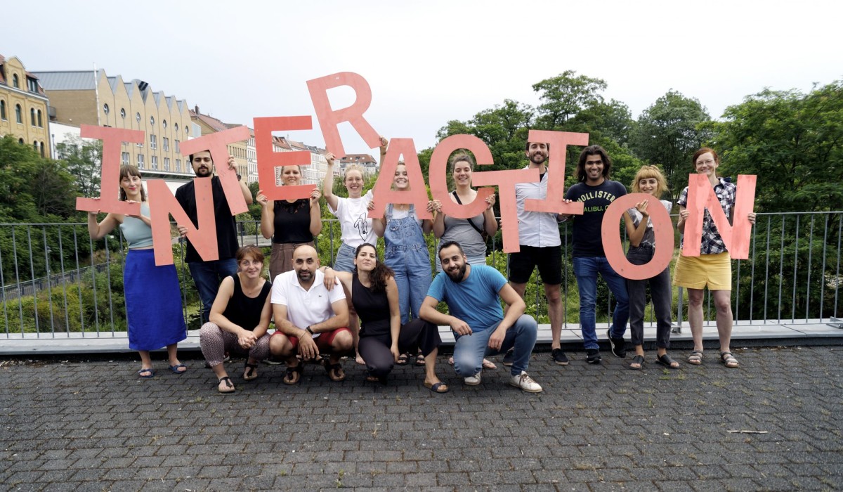 interaction-team-with-letters.jpg